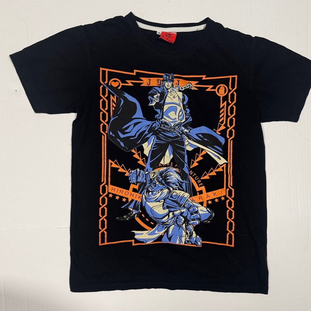 Vintage Hirohik Araki JoJo Manga Black Tee with Blue and Orange Graphic.